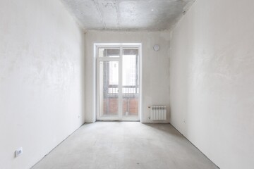 interior of the apartment without decoration in gray colors. rough finish