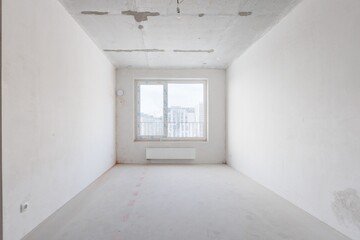 interior of the apartment without decoration in gray colors. rough finish