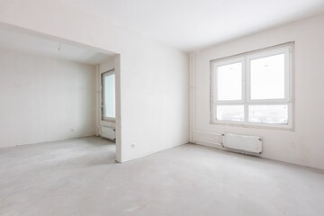 interior of the apartment without decoration in gray colors. rough finish