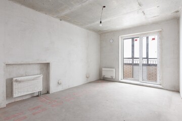 interior of the apartment without decoration in gray colors. rough finish