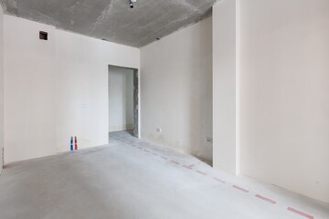 interior of the apartment without decoration in gray colors. rough finish