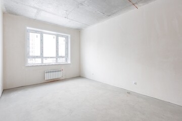 interior of the apartment without decoration in gray colors. rough finish