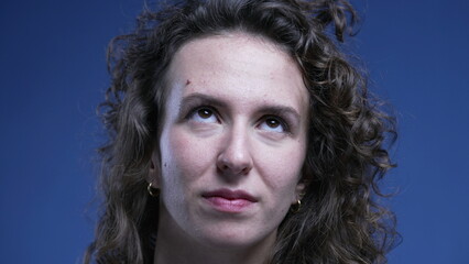 Woman rolling her eyes in contempt, cynical emotion of person rejecting gesture