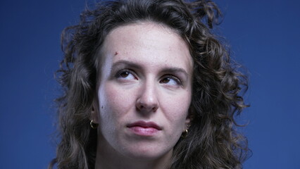 Woman rolling her eyes in contempt, cynical emotion of person rejecting gesture