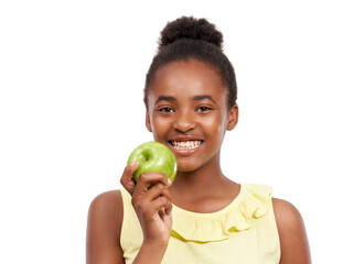Smile, health and portrait of girl and apple in studio for nutrition, wellness and diet. Food, self...