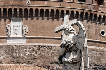 statues of angels holding instruments of the Passion of Jesus Christ on the Ponte Sant'Angelo; Rome, Italy