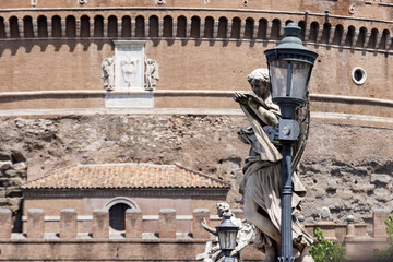 statues of angels holding instruments of the Passion of Jesus Christ on the Ponte Sant'Angelo; Rome, Italy