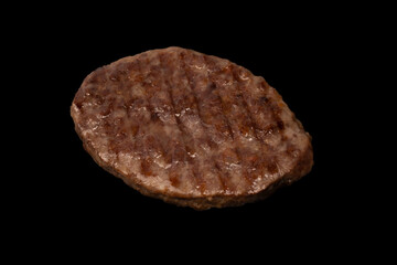 Cutlet with minced beef isolated on  black background.