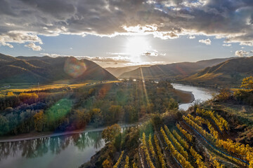 Panorama of Wachau valley (UNESCO) with autumn vineyards against Danube river near the Durnstein...