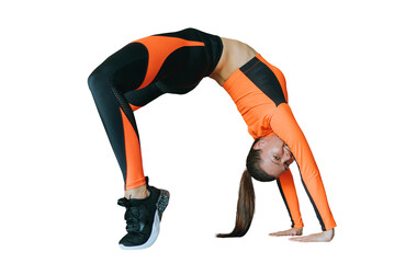 Cheerful hispanic young woman makes gymnastic bridge at flexibility workout, looks at camera toothy...