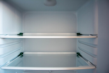 Empty Glass Shelves of the New Refrigerator Interior Organizer