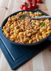 Creamy tuna with tomato sauce and shell noodles. One pot meal