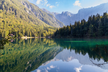 Fototapeta na wymiar Mountains and forest at Lago di Fusine in Italy