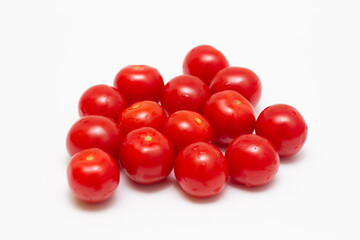 Cherry tomatoes on white isolated background