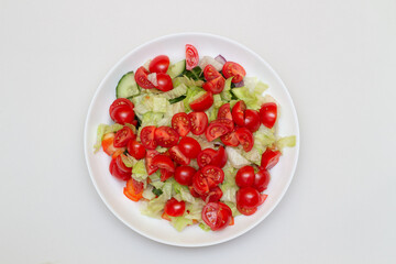 Vegetable salad on a plate. Vegetarian healthy food concept