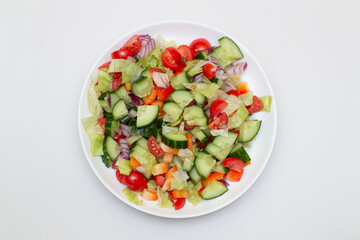 Vegetable salad on a plate. Vegetarian healthy food concept