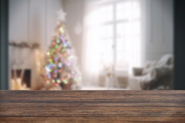 Empty table on  christmas tree background