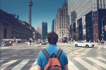 Tuinposter A Man in Business district at the Centre of city street, City Street Building View, Toronto, Ontario, Canada © Maksym