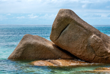 Fototapeta na wymiar Rocks at Anse Georgette at Praslin, The Seychelles, Huge granite rocks.