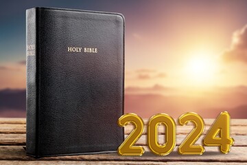 2024 new year sunrise and holly bible
