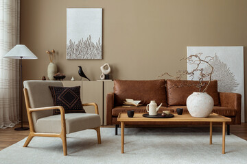 Interior design of cozy living room interior with mock up poster frame, brown sofa, gray armchair,...