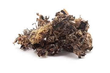 Close-up of Organic  Kalpasi or Dagad phool or black stone flower or chabila on white background. Pile of Indian Aromatic Spice. Front view