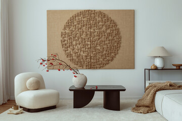 Creative composition of japandi  living room interior with mock up poster frame, black coffee table, rounded shapes armchair, brown pouf and personal accessories. Home decor. Template.