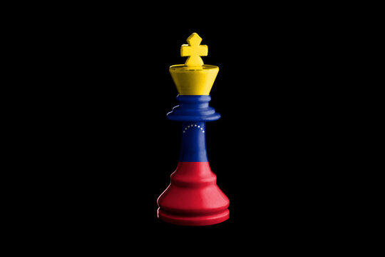 Venezuela flags paint over on chess king. 3D illustration.