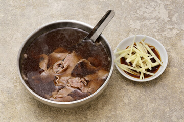Beef soup is often eaten as breakfast in Tainan. Taiwanese food.