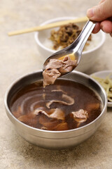 Beef soup is often eaten as breakfast in Tainan. Taiwanese food.