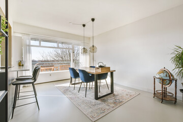 Table and chair in contemporary apartment