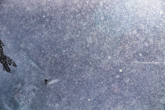 Snowstorm Enveloping a unrecognizable climber in Zermatt