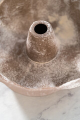 Lemon blueberry bundt cake with powdered sugar dusting