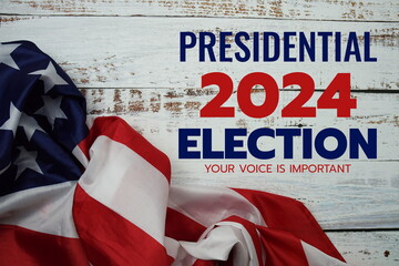 Fototapeta na wymiar American flag with Presidential election 2024 text top view on wooden background