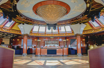 Opulent elegant interiors inside ballroom lounge onboard ocean liner cruiseship cruise ship witch...