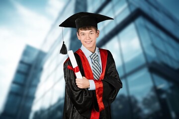 Happy young graduated student in campus