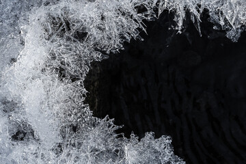 Intricate snowflake patterns on a dark background