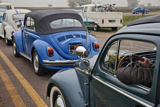 Line of vintage cars Volkswagen Type 1 Beetle in classic car meeting Battesimo dell'aria, on November 4, 2018 in Lugo, RA, Italy