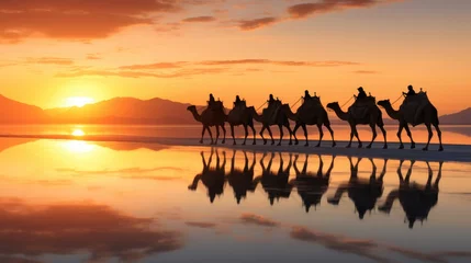 Foto op Aluminium Caravan of camels on the salt lake at sunrise. © Lubos Chlubny