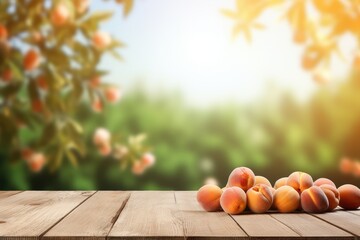 Wooden table top with apricots on blur background with apricot orchard - obrazy, fototapety, plakaty