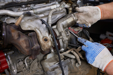 Engine valve car maintenance. The cylinder block of the four-cylinder engine. Disassembled motor...