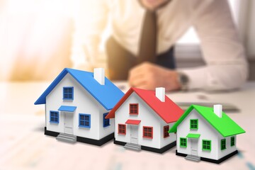 Real estate agent model house  on the desk