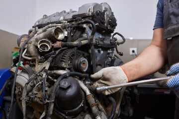 Engine valve car maintenance. The cylinder block of the four-cylinder engine. Disassembled motor...