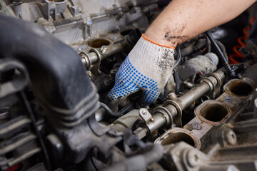 Engine valve car maintenance. The cylinder block of the four-cylinder engine. Disassembled motor...
