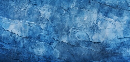 Background and texture for a design in navy blue abstraction. Antique blue background. Stone-made texture with a rough blue hue. Abstract deep blue texture seen up close.