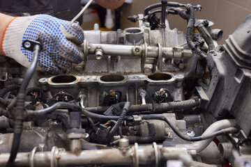 Engine valve car maintenance. The cylinder block of the four-cylinder engine. Disassembled motor...