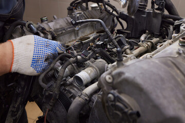 Engine valve car maintenance. The cylinder block of the four-cylinder engine. Disassembled motor...