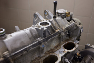 Engine valve car maintenance. The cylinder block of the four-cylinder engine. Disassembled motor...