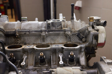 Engine valve car maintenance. The cylinder block of the four-cylinder engine. Disassembled motor...