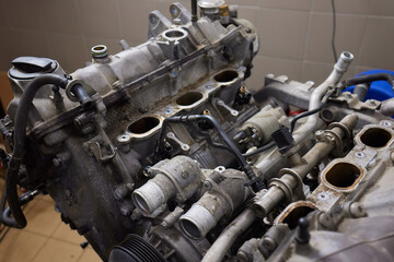 Engine valve car maintenance. The cylinder block of the four-cylinder engine. Disassembled motor...